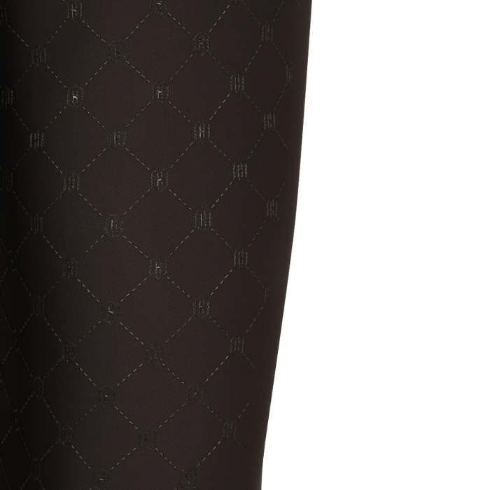 Diamond grip material on black riding tights 