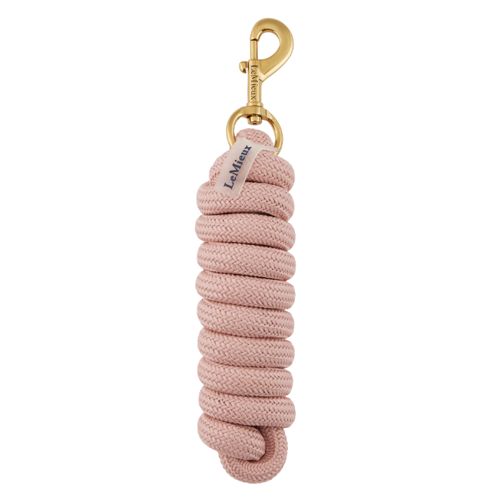 LeMieux AW26 Essence Leadrope Variant Colour Wild Rose
A pink braided rope horse lead with a gold-tone metal clasp and a small white fabric tag reading 'LeMieux'.