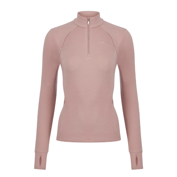 LeMieux AW26 Frances Quarter Zip Fleece Varient Wild Rose. A women's long-sleeve quarter-zip athletic top in a dusty rose pink color, featuring a mock neck collar, zippered arm cuffs, and a subtle embroidered logo on the left chest, shown against a plain white background.