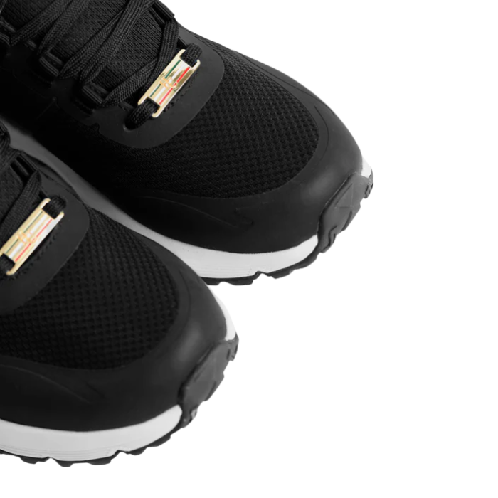 Close-up of black training shoes on a white background