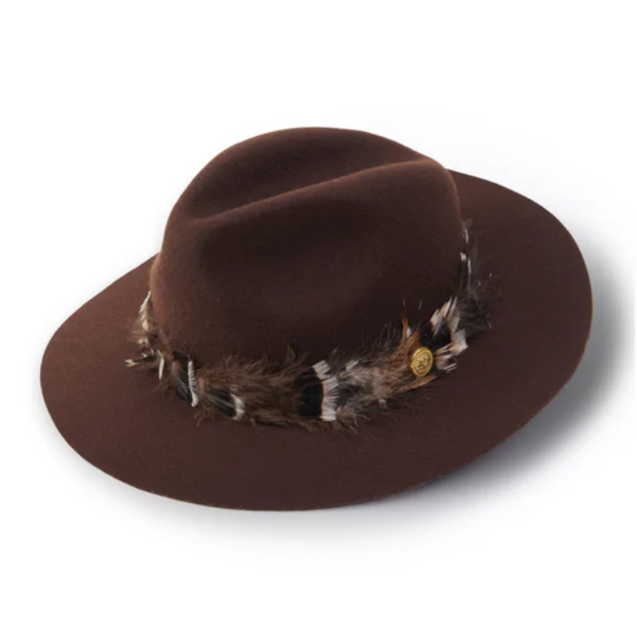 Brown fedora hat with feather band on a white background