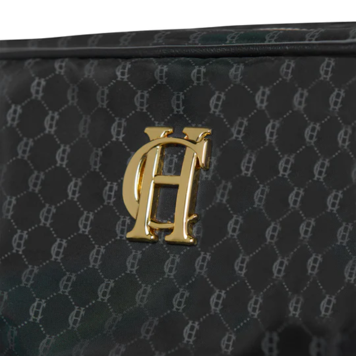 Black textured surface with a gold logo on a black background
