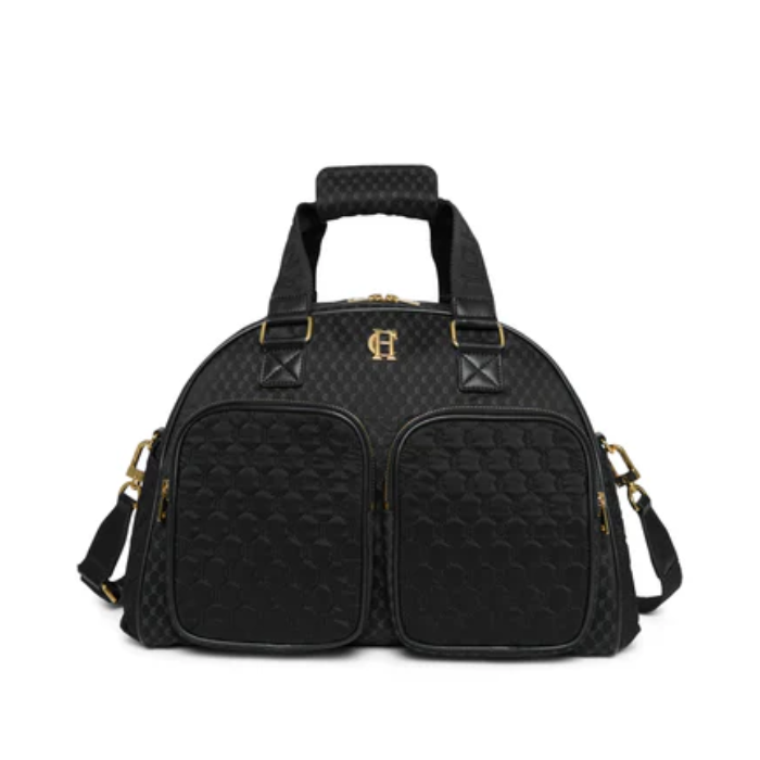 Black quilted handbag with gold accents on a white background