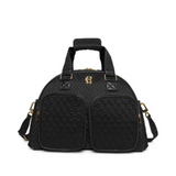 Black quilted handbag with gold accents on a white background