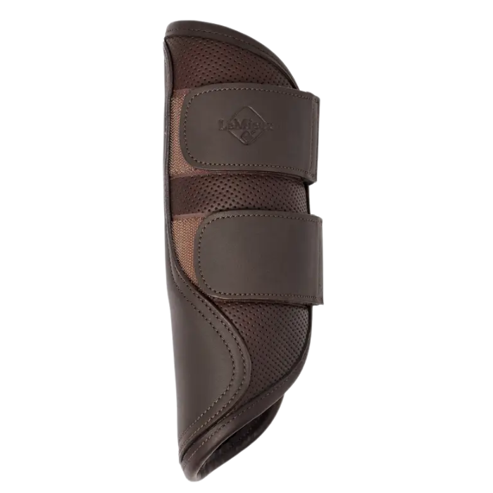 Brown horse boot with straps on a white background