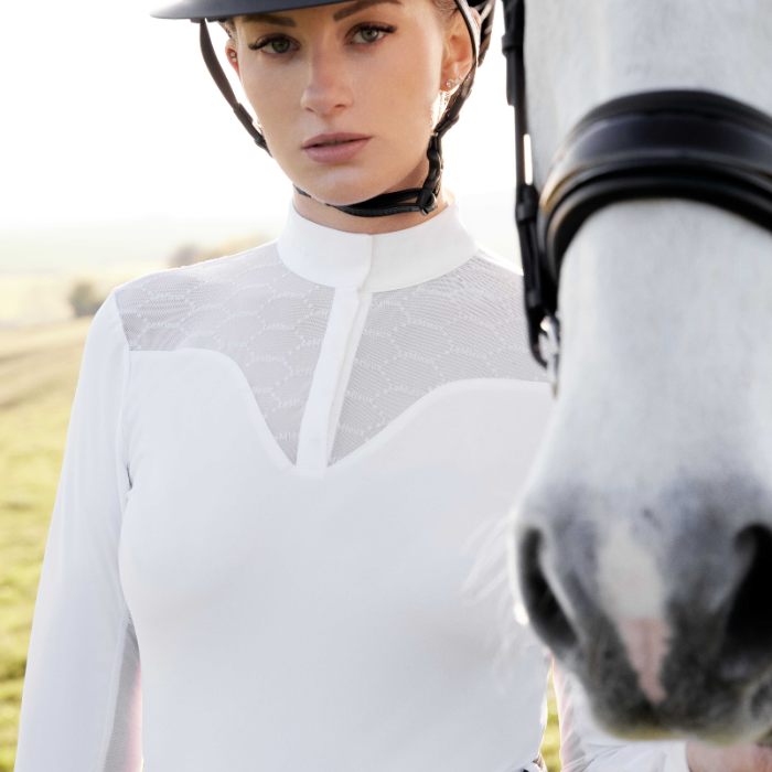 Close up detail of woman wearing the LeMieux Emily Long Sleeve Show Shirt in White 