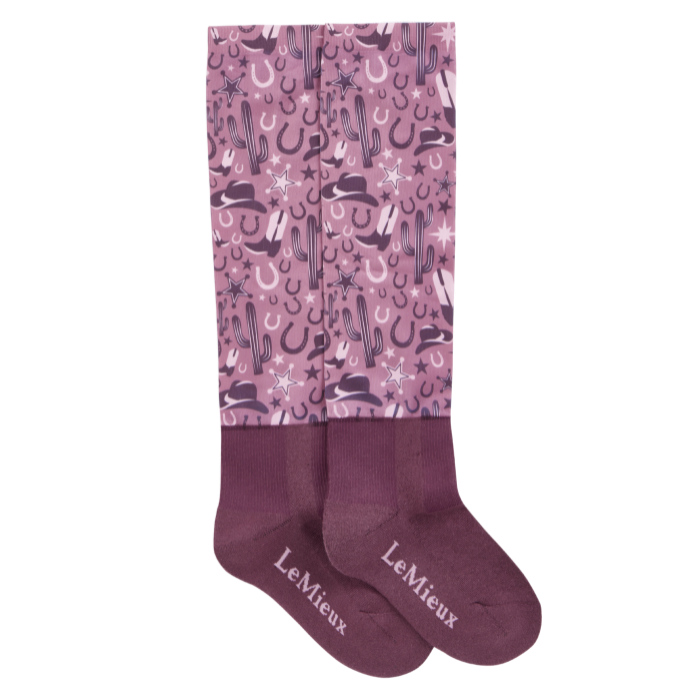 Pink pair of socks with cactus and western pattern on a white background