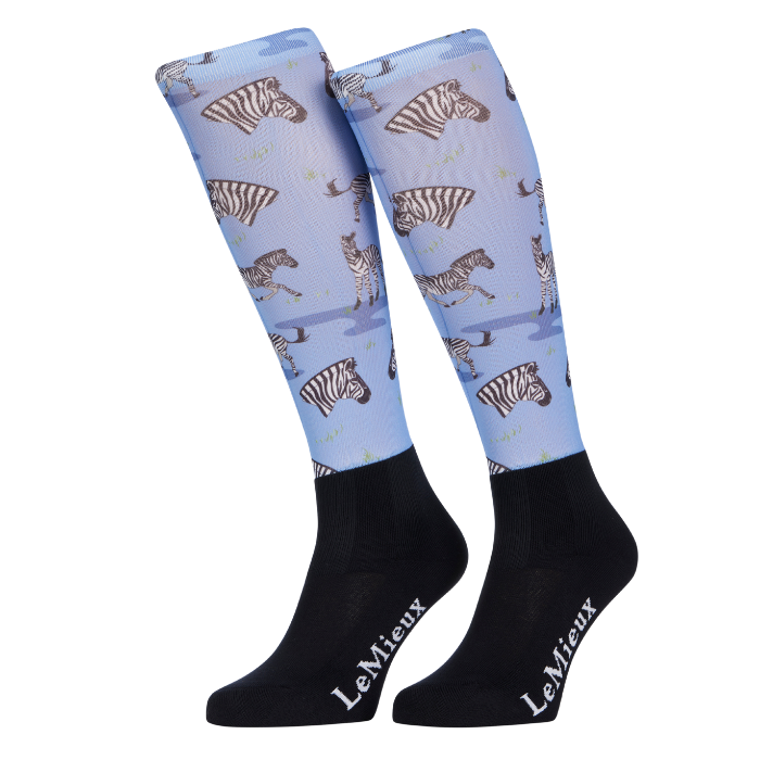 Knee-high socks with zebra pattern and black cuffs and toes, branded 'LeMieux'.