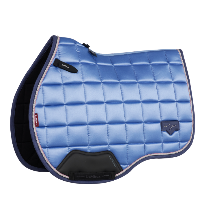 Powder blue glossy saddle pad on a white background