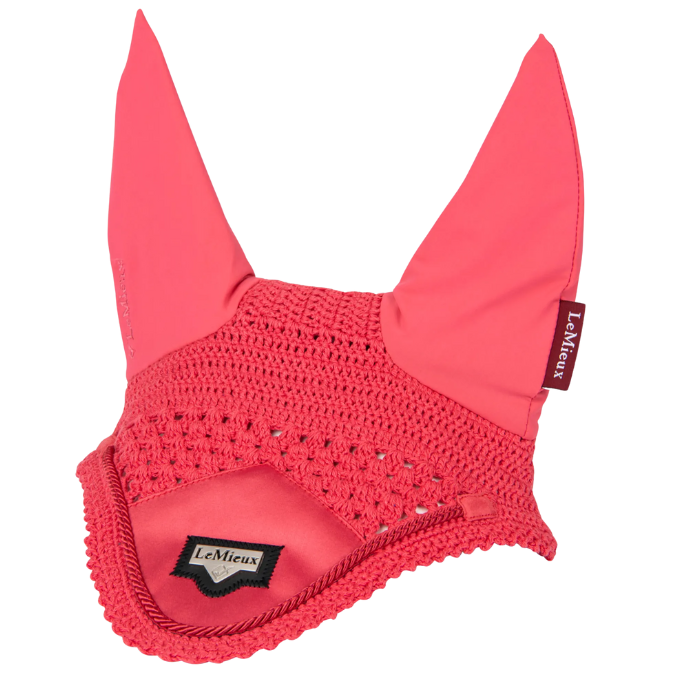 Red ear bonnet for a horse on a white background