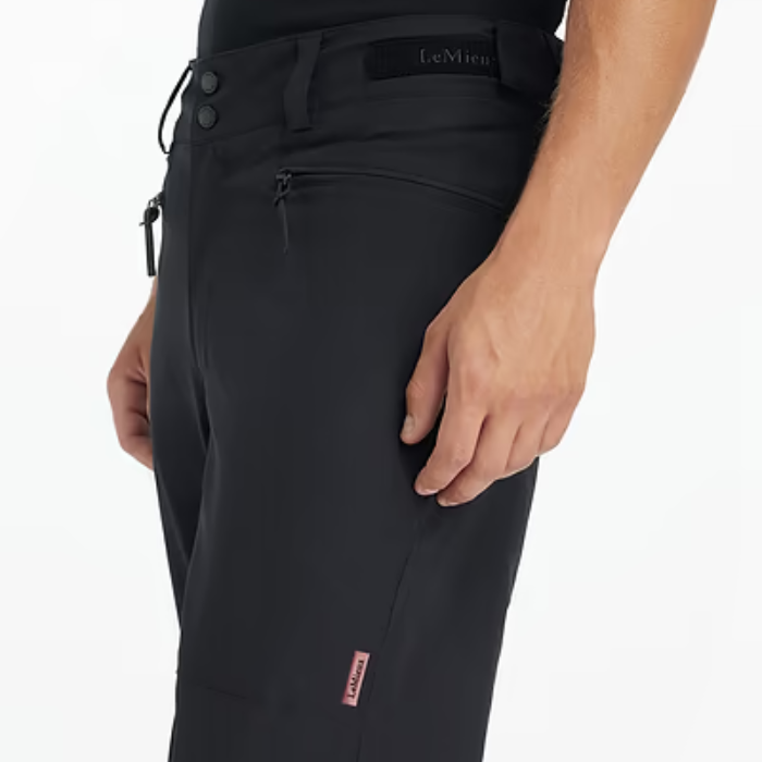Black trousers with a brand logo on a white background