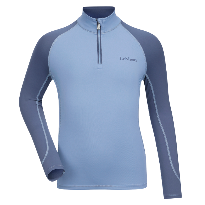 Light blue long-sleeve shirt with quarter zip and dark blue sleeves on a white background