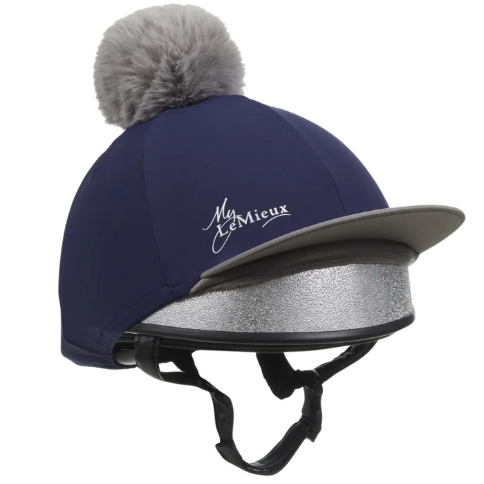 Navy riding helmet with gray interior and pom-pom, featuring the brand 'My LeMieux'.