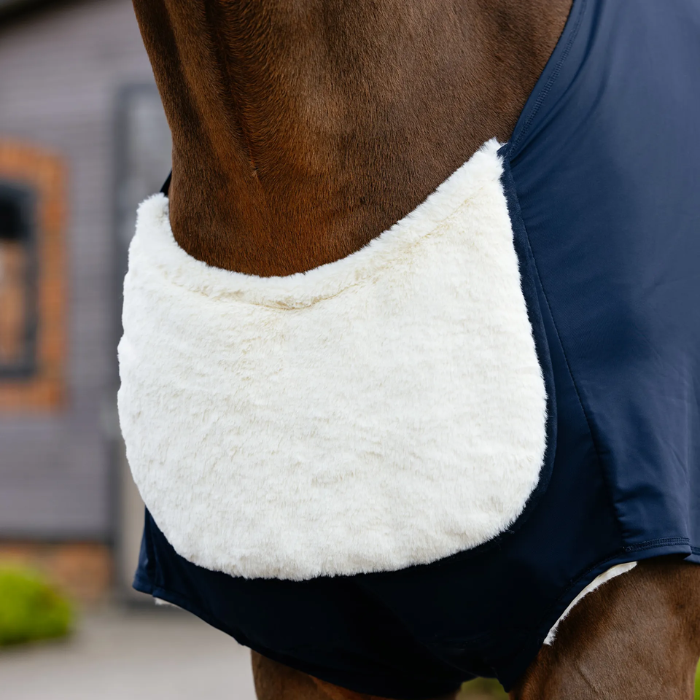Close-up of a horse wearing a chest bib with soft fleece