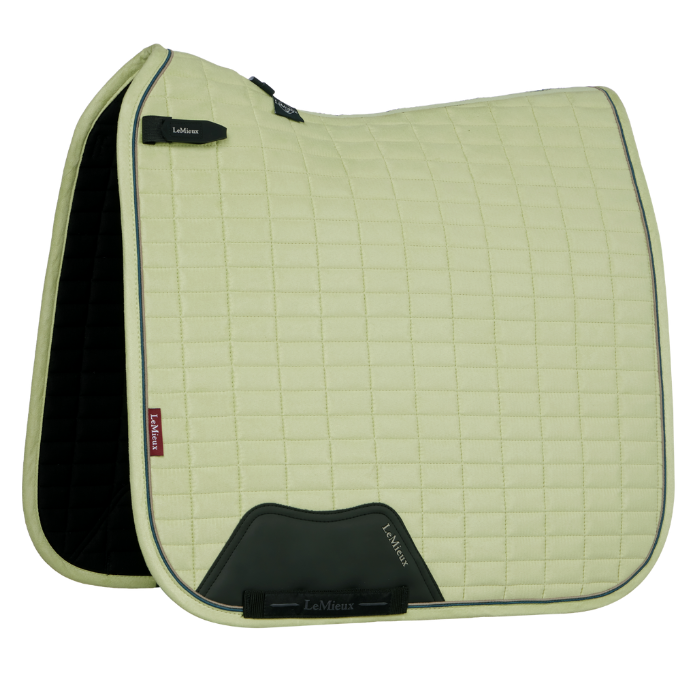 Yellow saddle pad with black accents on a white background