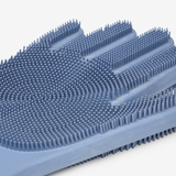 Blue silicone grooming glove with textured surface on a white background