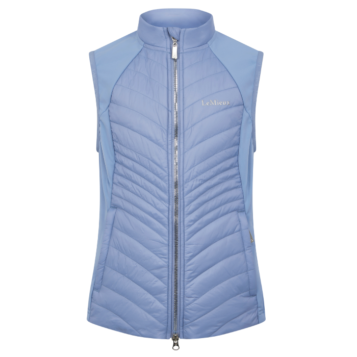 Light blue quilted vest with a zipper on a white background