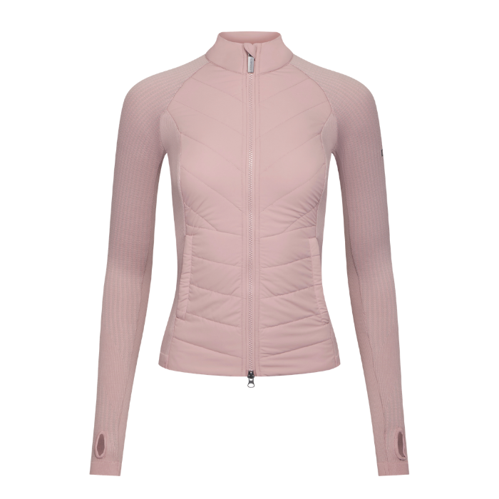 LeMieux AW26 Maddie Hybrid Jacket Varient Wild Rose. A light pink long-sleeve zip-up jacket with a mock neck and quilted chest panel, shown on a plain white background.