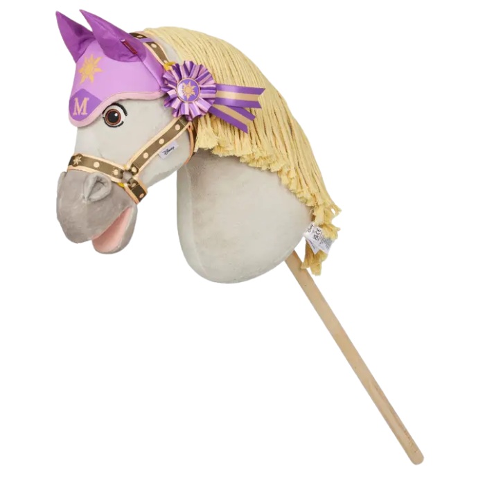 Toy horse with a purple rosette and decorative headstall on a white background