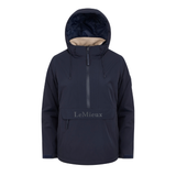 LeMieux AW26 Phoebe Half Zip Waterproof Anorak Varient Navy. A navy blue hooded jacket with a beige sherpa lining visible inside the hood, featuring a front zipper, drawstrings, and a front pocket with the brand name 'LeMieux' printed on it.
