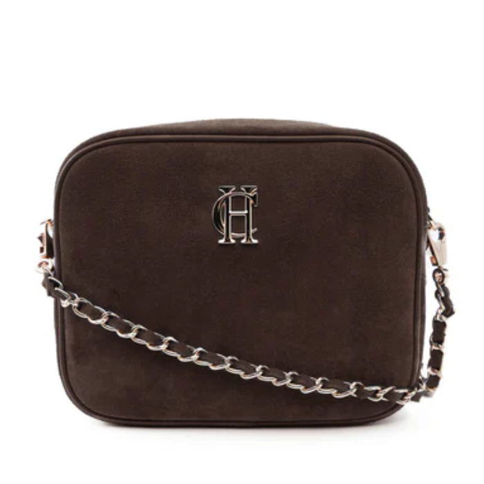 Chocolate suede handbag with HC logo and chain strap on a white background