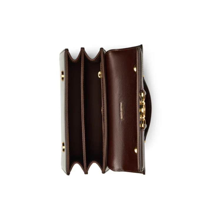 Brown leather handbag with gold chain on a white background