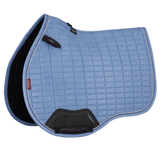 Blue quilted saddle pad on a white background