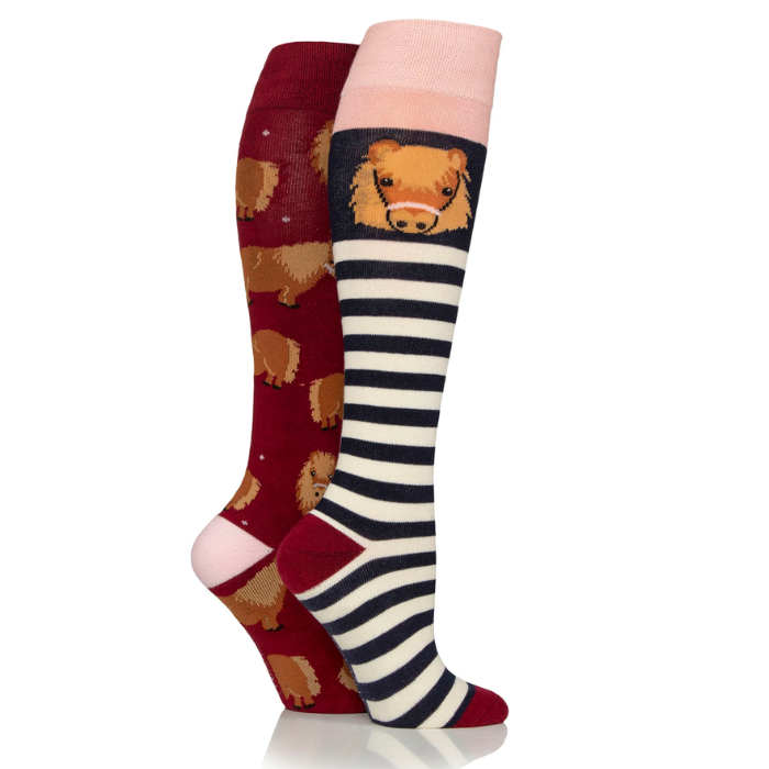 Two pairs of knee-high socks with animal patterns on a white background