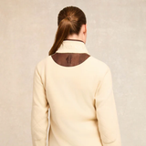 Pale cream fleece jacket on a pale background