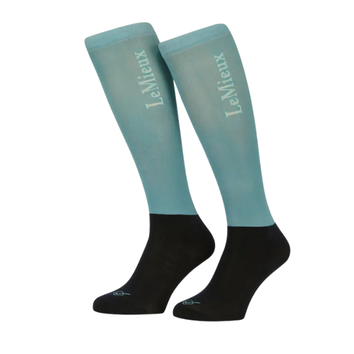 Blue and blue long socks with LeMieux branding on a white background