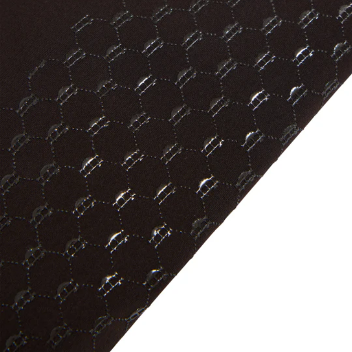 Close-up of a textured brown fabric with a subtle pattern on a white background