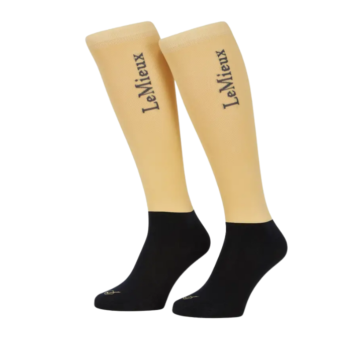 Yellow and black long socks with LeMieux branding on a white background