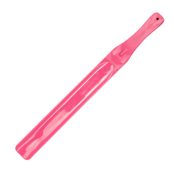 Pink feed stirring stick on a white background