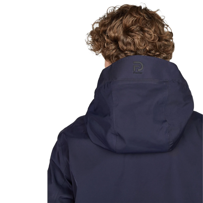 Person wearing a navy blue jacket with a brand logo on a white background