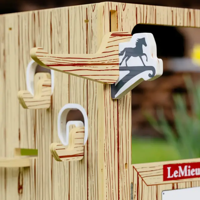 Wooden equestrian-themed toy with horse figure and LeMieux branding.