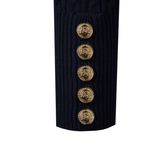 Navy ribbed sweater with gold buttons on a white background