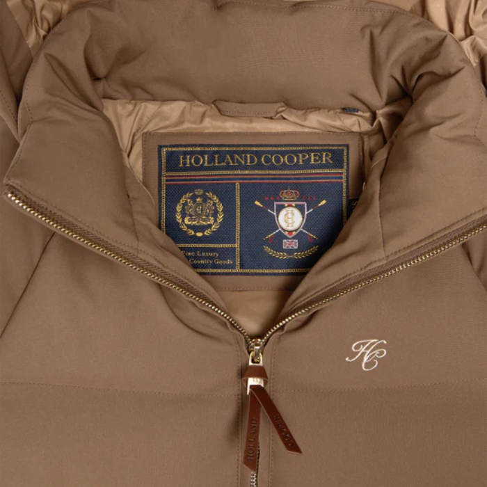Brown jacket with Holland Cooper logo and branding inside