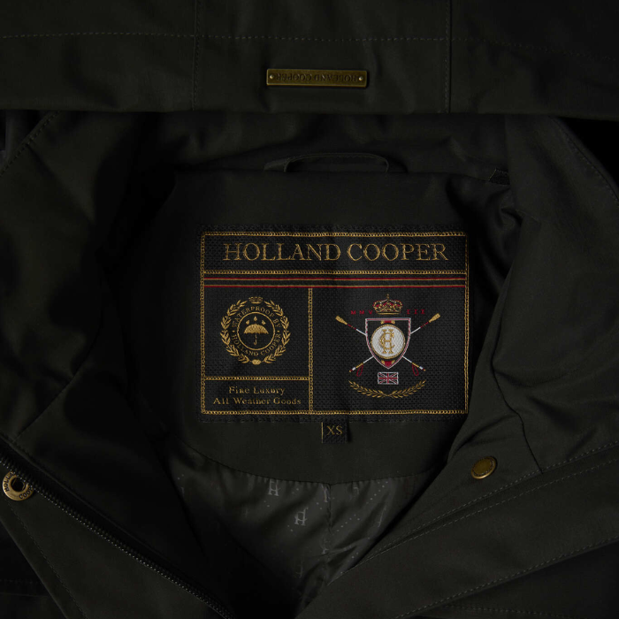 Close-up of Holland Cooper label on a dark jacket