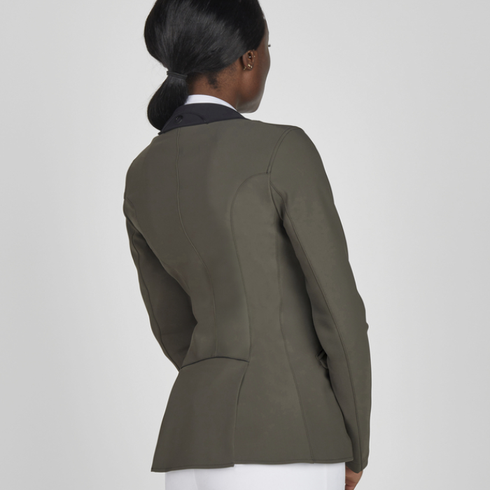 Person wearing a green blazer from behind on a white background