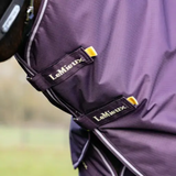 Close up of velcro straps on a horse rug with a blurred background