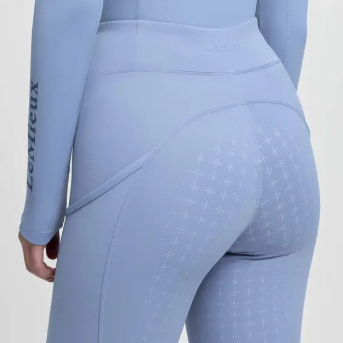 Light blue leggings with a pattern on a white background