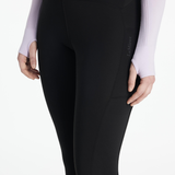 Black riding leggings with a visible brand logo on a white background