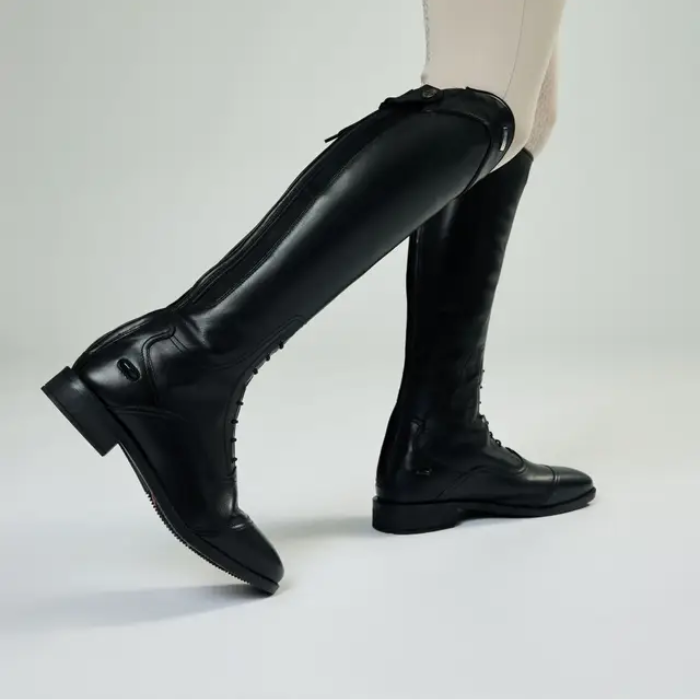Black knee-high boots on a white background