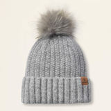 Light grey beanie hat with a fluffy bobble on a light background