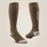 Pair of brown socks with ARIAT branding on a beige background