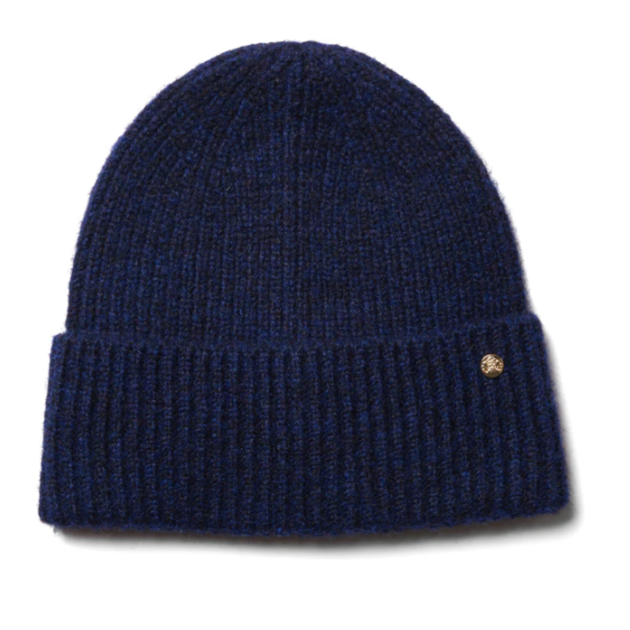 Blue knit beanie with a gold emblem on a white background