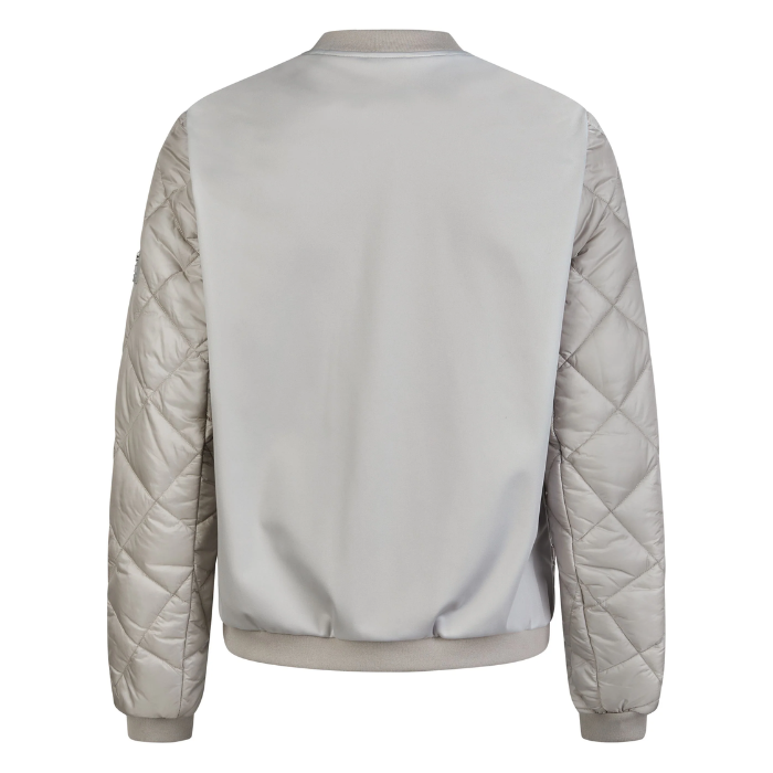 Pale grey jacket with quilted sleeves on a white background