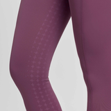 Pink legings with grip texture on a grey background