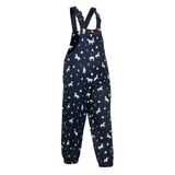 LeMieux AW26 Mini Pippin Splash Dungarees Varient Navy. A pair of navy blue children's rainoveralls with adjustable shoulder straps, featuring an all-over print of white horses, yellow flowers, and small green leaves, shown against a plain white background.