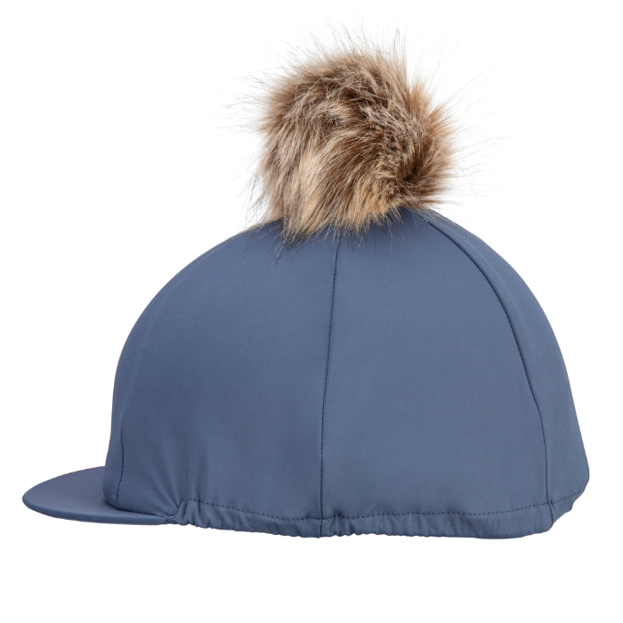 Blue cap with a fur pom-pom on a white background